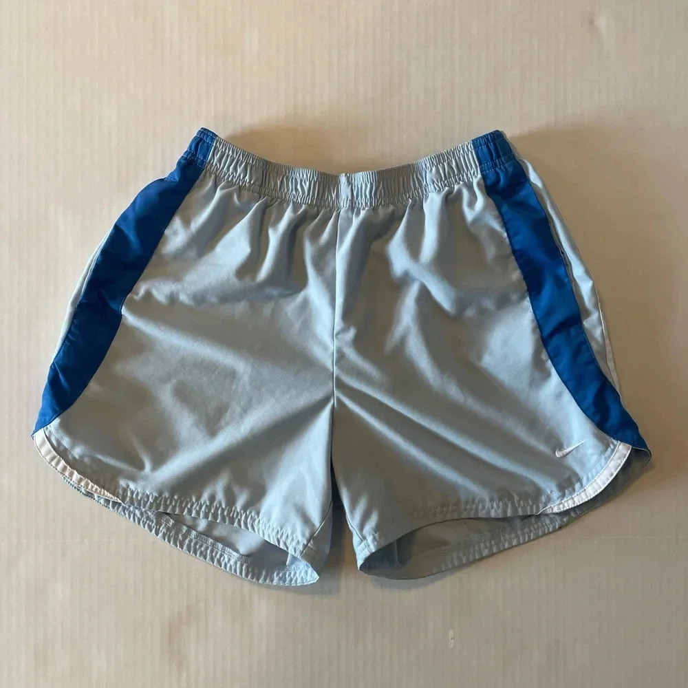 Nike blue athletic shorts side pockets size small